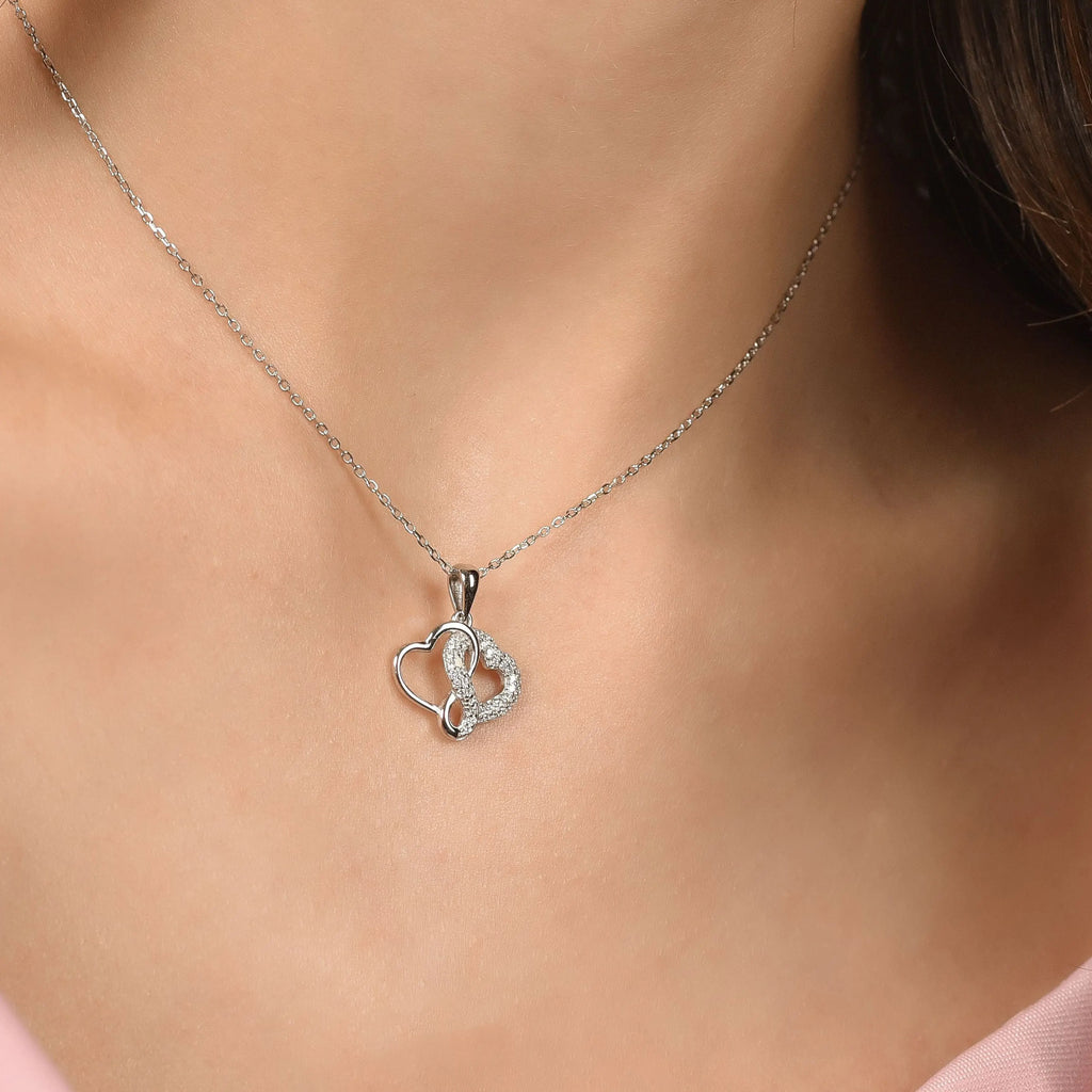 COLLANA IN ARGENTO CON CUORI CON CRISTALLI BIANCHI Melitea