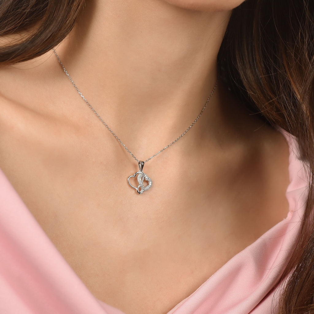 COLLANA IN ARGENTO CON CUORI CON CRISTALLI BIANCHI Melitea