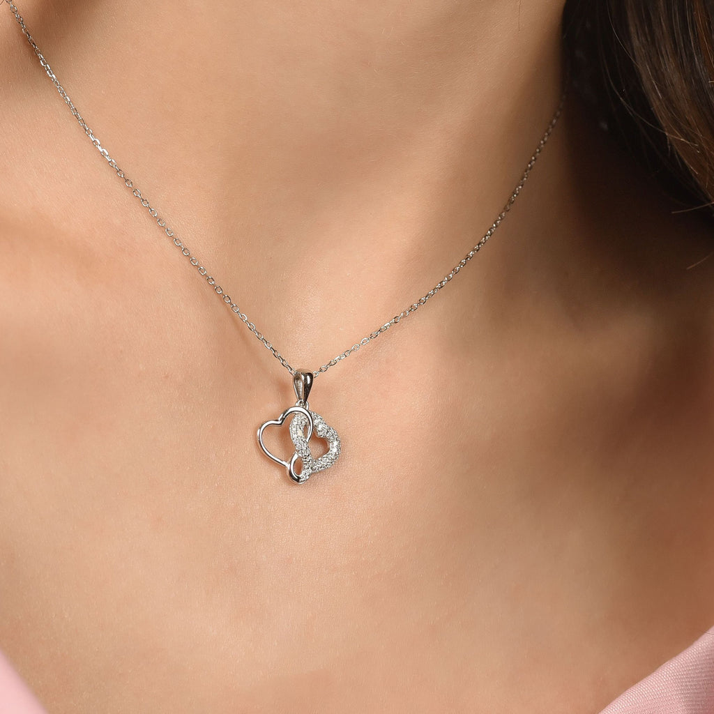 COLLANA IN ARGENTO CON CUORI CON CRISTALLI BIANCHI Melitea